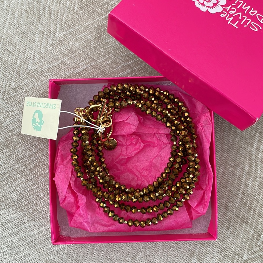 NWT Bead wrap that can be worn as a necklace or bracelet in metallic gold
